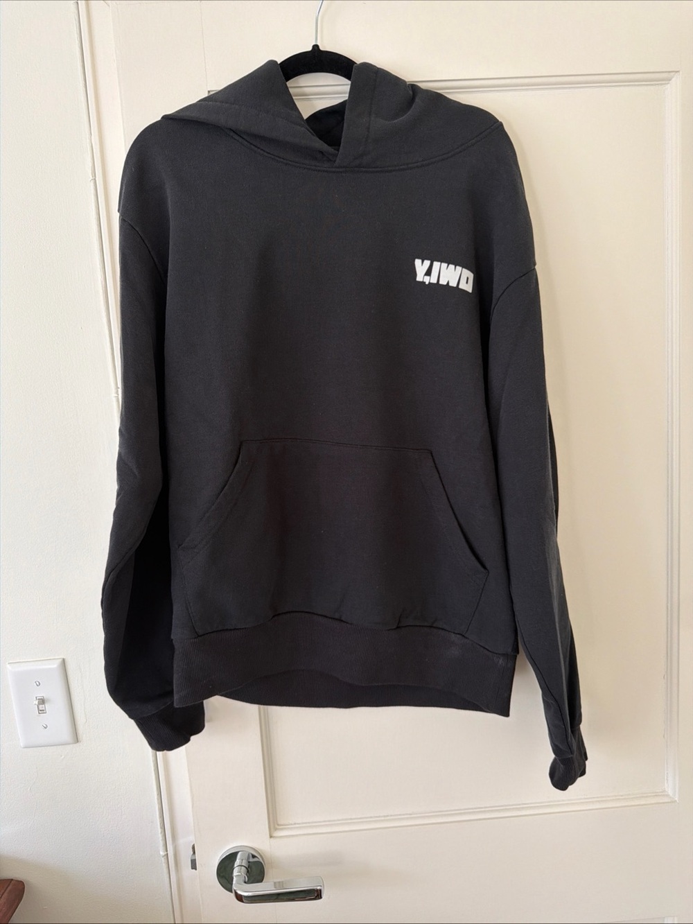 Black Pullover Hoodie with Small White Chest Logo